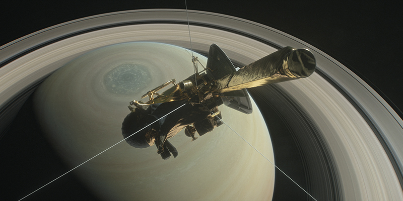 La sonda Cassini in un'elaborazione grafica con il pianeta Saturno sullo sfondo (NASA/JPL-Caltech)