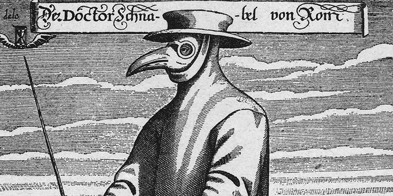 Un "medico" con la classica maschera a forma di becco, nel quale erano inserite spezie che si pensava purificassero l'aria evitando i contagi da peste, in una stampa di metà Seicento (Hulton Archive/Getty Images)