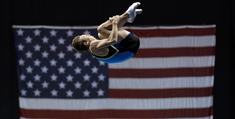 Il ginnasta Paul Bretscher nel suo esercizio al trampolino durante i campionati statunitensi di ginnastica, il 29 giugno 2017, a Milwaukee 
(AP Photo/Morry Gash)