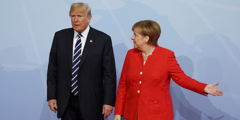 Angela Merkel e Donald Trump 
(AP Photo/Evan Vucci)