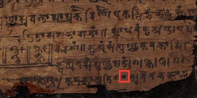 Una parte del manoscritto di Bakhshali in cui si vede un simbolo che indica lo zero (Bodleian Library)
