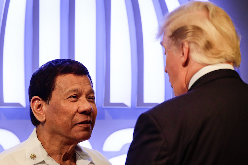 Philippine President Rodrigo Duterte (L) talks to US President Donald J. Trump (R) before the opening ceremony of the 31st Association of South East Asian Nations (ASEAN) Summit in Manila on November 13, 2017. 
World leaders are in the Philippines' capital for two days of summits. / AFP PHOTO / POOL / Mark R. CRISTINO (Photo credit should read MARK R. CRISTINO/AFP/Getty Images)