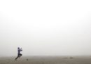 Sono giorni di nebbia e smog, in India