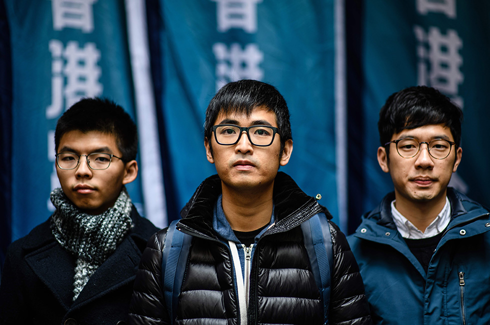 Joshua Wong, Nathan Law e Alex Chow a Hong Kong, 6 febbraio 2018.
(ANTHONY WALLACE/AFP/Getty Images)