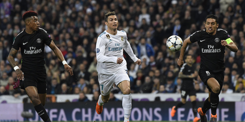 Cristiano Ronaldo tra Presnel Kimpembe e Marquinhos nella partita di andata a Madrid (CHRISTOPHE SIMON/AFP/Getty Images)