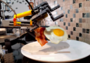 Un robot di LEGO che prepara la colazione