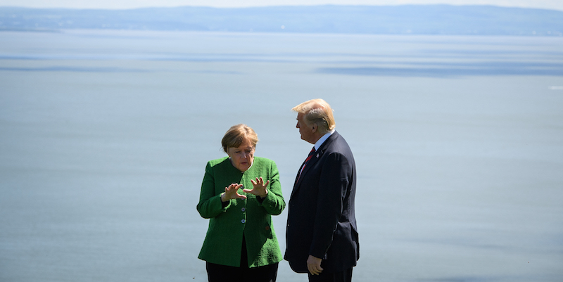 Angela Merkel e Donald Trump e La Malbaie, Canada (Leon Neal/Getty Images)