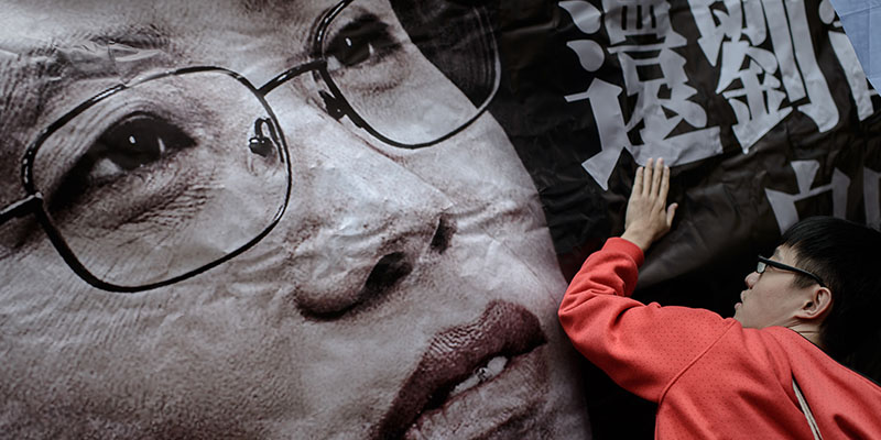 Un manifestante che sostiene Liu Xia, Pechino, 20 febbraio 2014
(PHILIPPE LOPEZ/AFP/Getty Images)