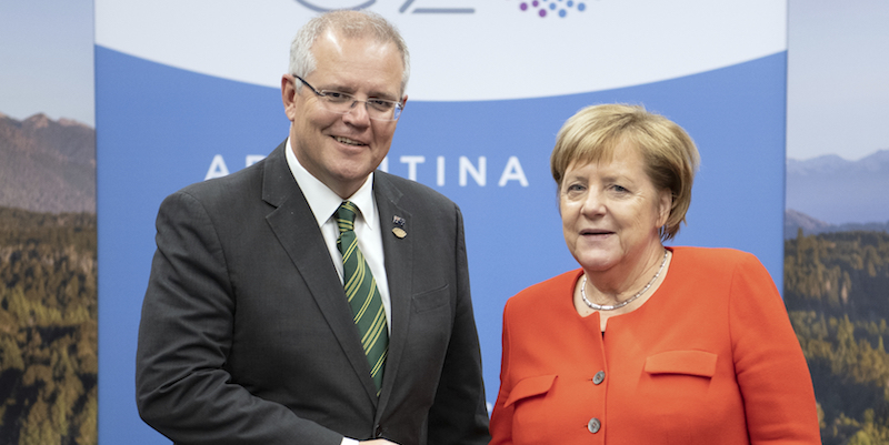 Scott Morrison e Angela Merkel 
(Ralf Hirschberger/picture-alliance/dpa/AP Images