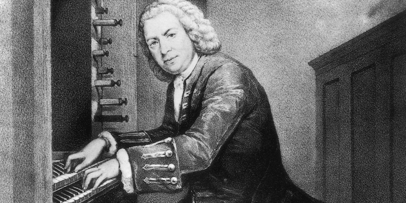 Johann Sebastian Bach all'organo, nel 1725 circa, in una stampa conservata al British Museum (Rischgitz/Getty Images)