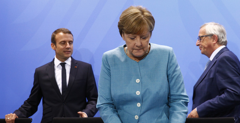 Angela Merkel, Emmanuel Macron e Jean-Claude Juncker (Michele Tantussi/Getty Images)