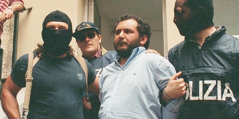Giovanni Brusca condotto in carcere dopo la sua cattura, il 21 maggio 1996 (ANSA / FRANCO LANNINO)