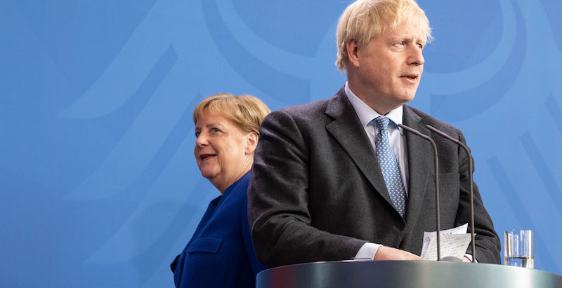 Boris Johnson e Angela Merkel (Omer Messinger/Getty Images)