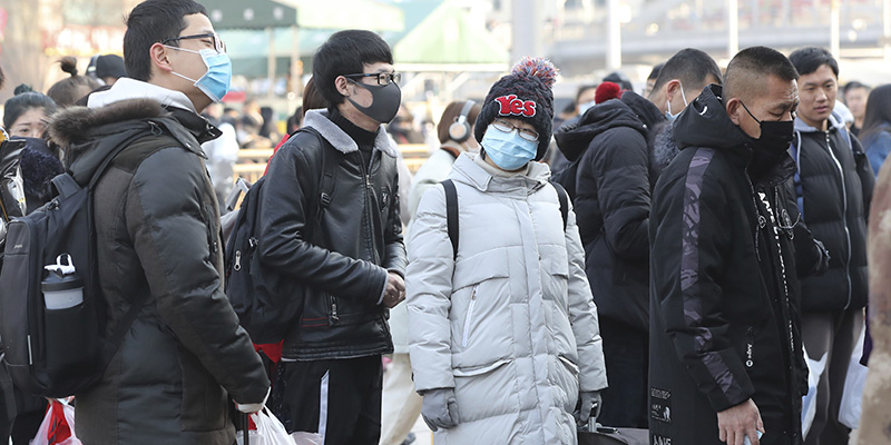 Persone alla stazione di Pechino, 22 gennaio 2020 (The Yomiuri Shimbun via AP Images)