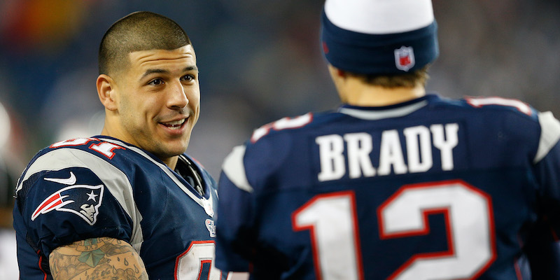 Aaron Hernandez e Tom Brady con i New England Patriots nel 2012 (Jim Rogash/Getty Images)