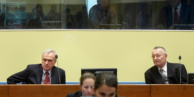 Jovica Stanišić e Franko Simatović al processo (AP Photo/Martijn Beekman, pool)