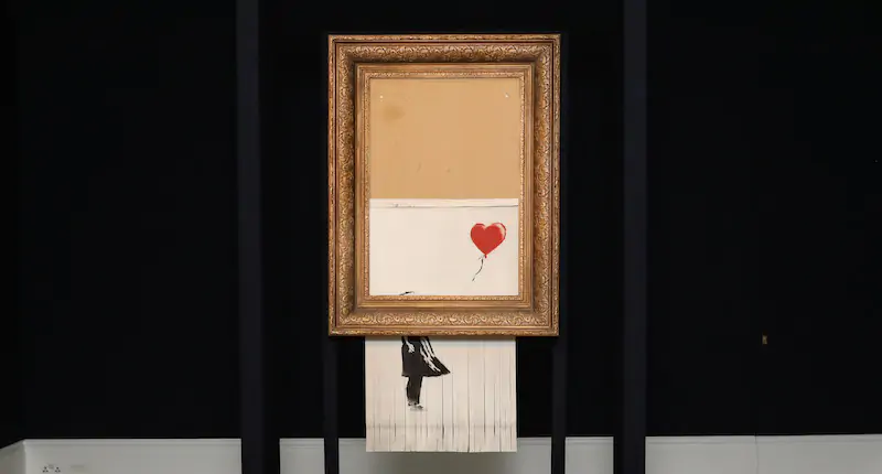 Il quadro di Banksy che si era autodistrutto, rinominato dallo stesso Banksy "Love is in the Bin" (Tristan Fewings/Getty Images for Sotheby's)