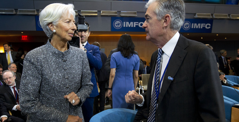 La direttrice della BCE, Christine Lagarde, e il direttore della FED, Jerome Powell (AP Photo/Jose Luis Magana)
