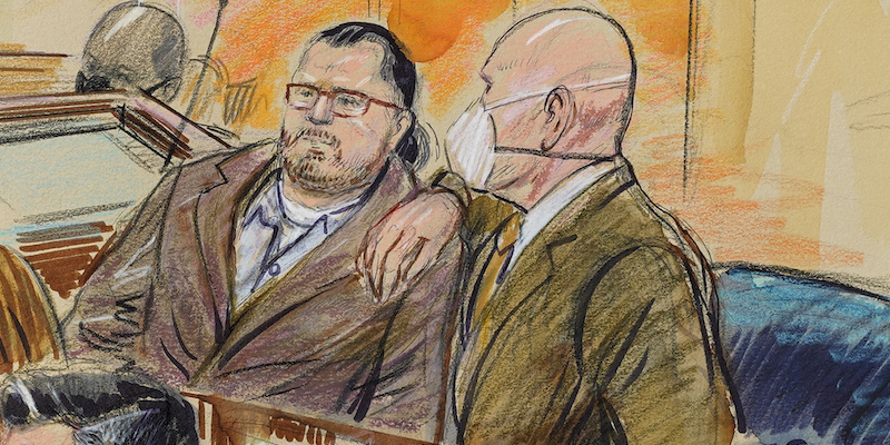 Un'immagine stilizzata ritraente Guy Reffitt insieme al suo avvocato (Dana Verkouteren via AP, File)