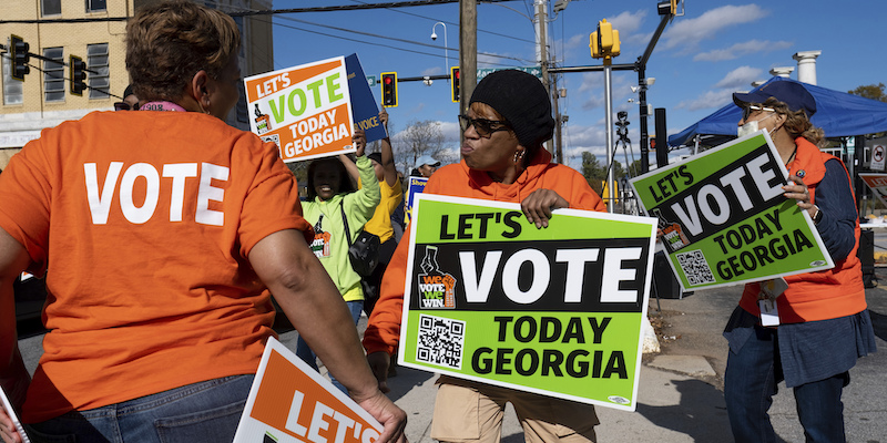 Un momento della campagna per il ballottaggio ad Atlanta (AP Photo/Ben Gray)