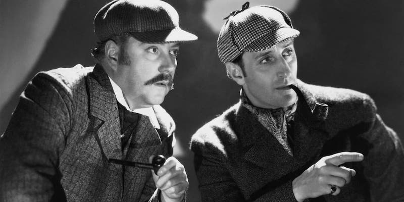Gli attori Basil Rathbone e Nigel Bruce nei ruoli di Sherlock Holmes e del dottor Watson