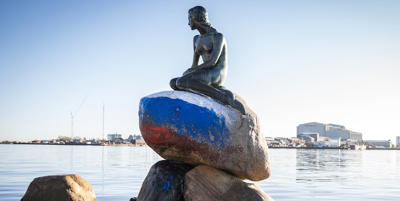 The Russian flag is painted on the stone where the Little Mermaid sits on, after the sculpture was vandalized, in Copenhagen, Denmark, Thursday, March 2, 2023. (Ida Marie Odgaard/Ritzau Scanpix via AP)